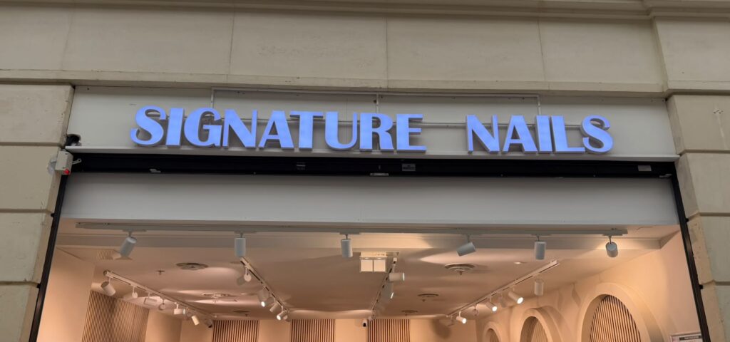 Logo de Signature Nails